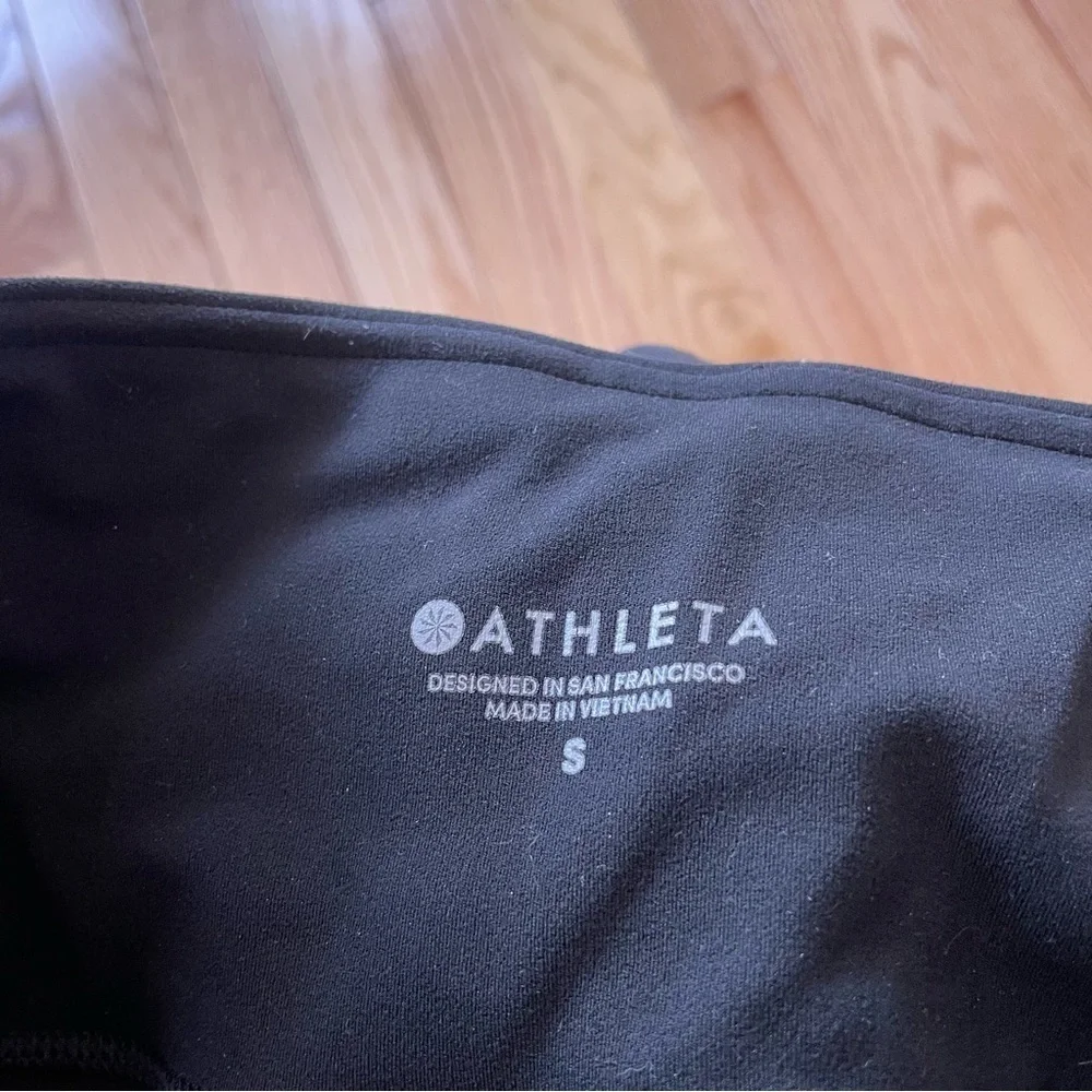 Athleta Black Niyama 7/8 Length Laser Cut Side Pockets Leggings 353777 EUC S